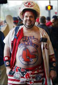 Red Sox Fan with large baseball helmet